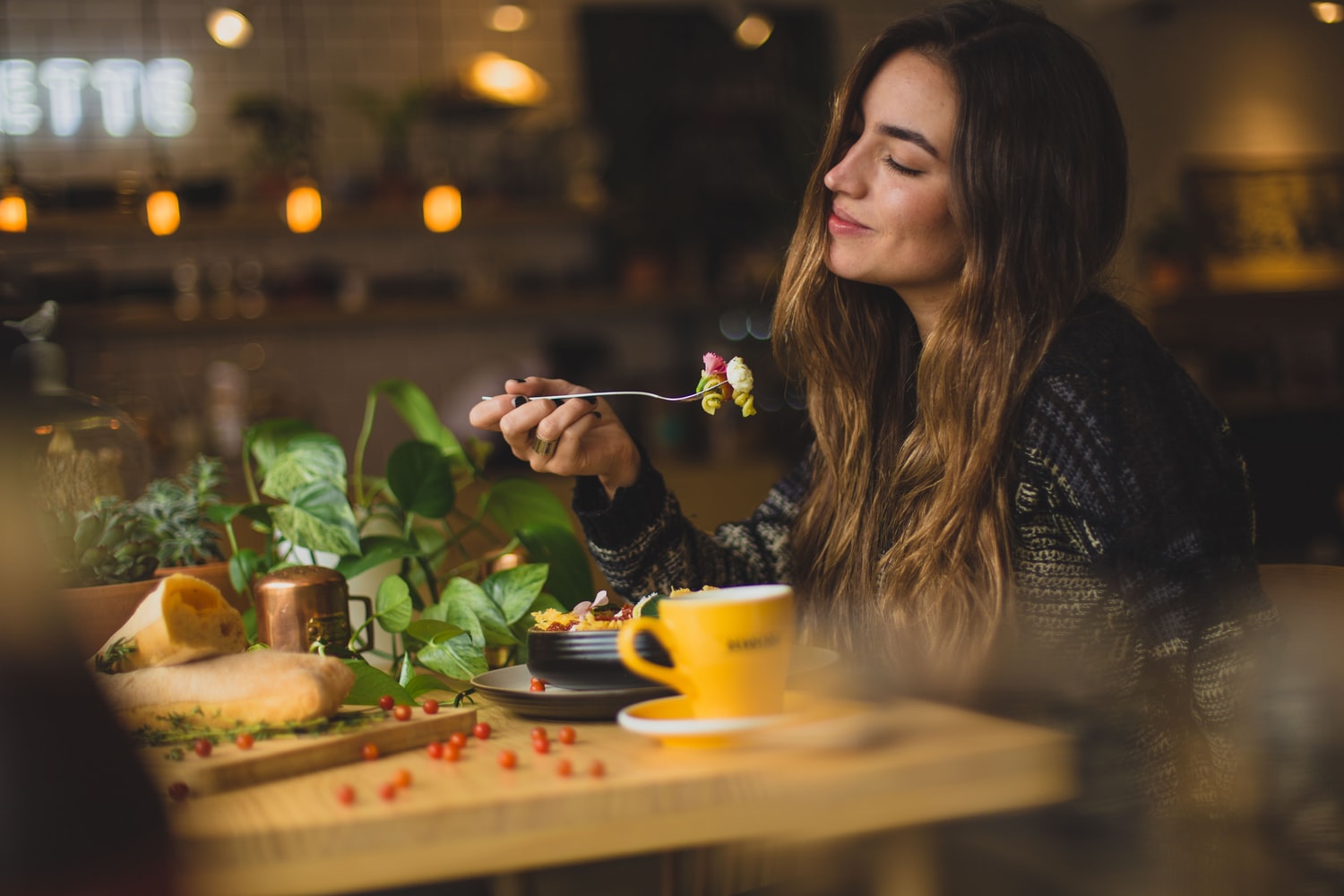 woman eating pasta