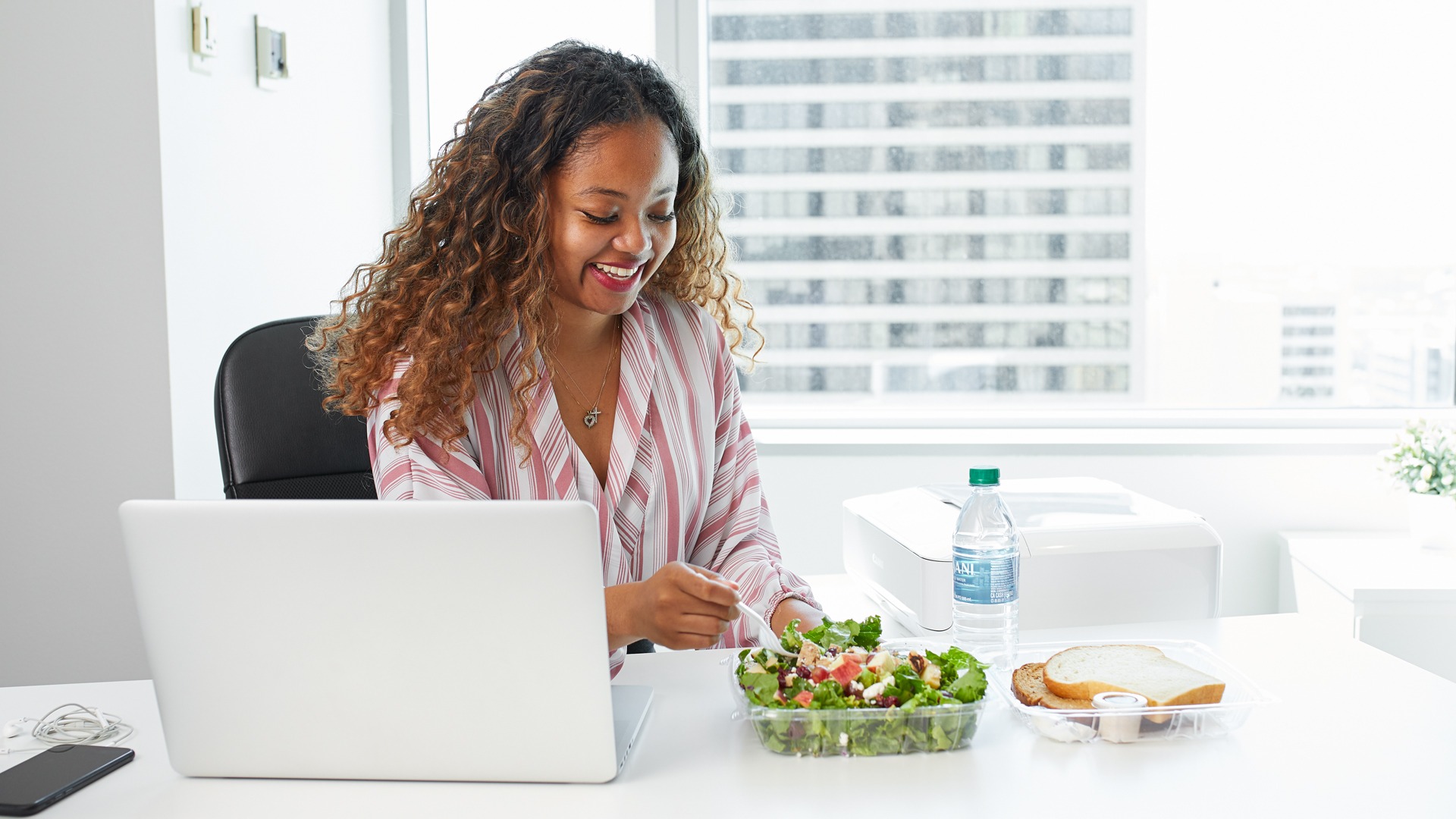 Office Employee Enjoying Apple Spice Catered Salad