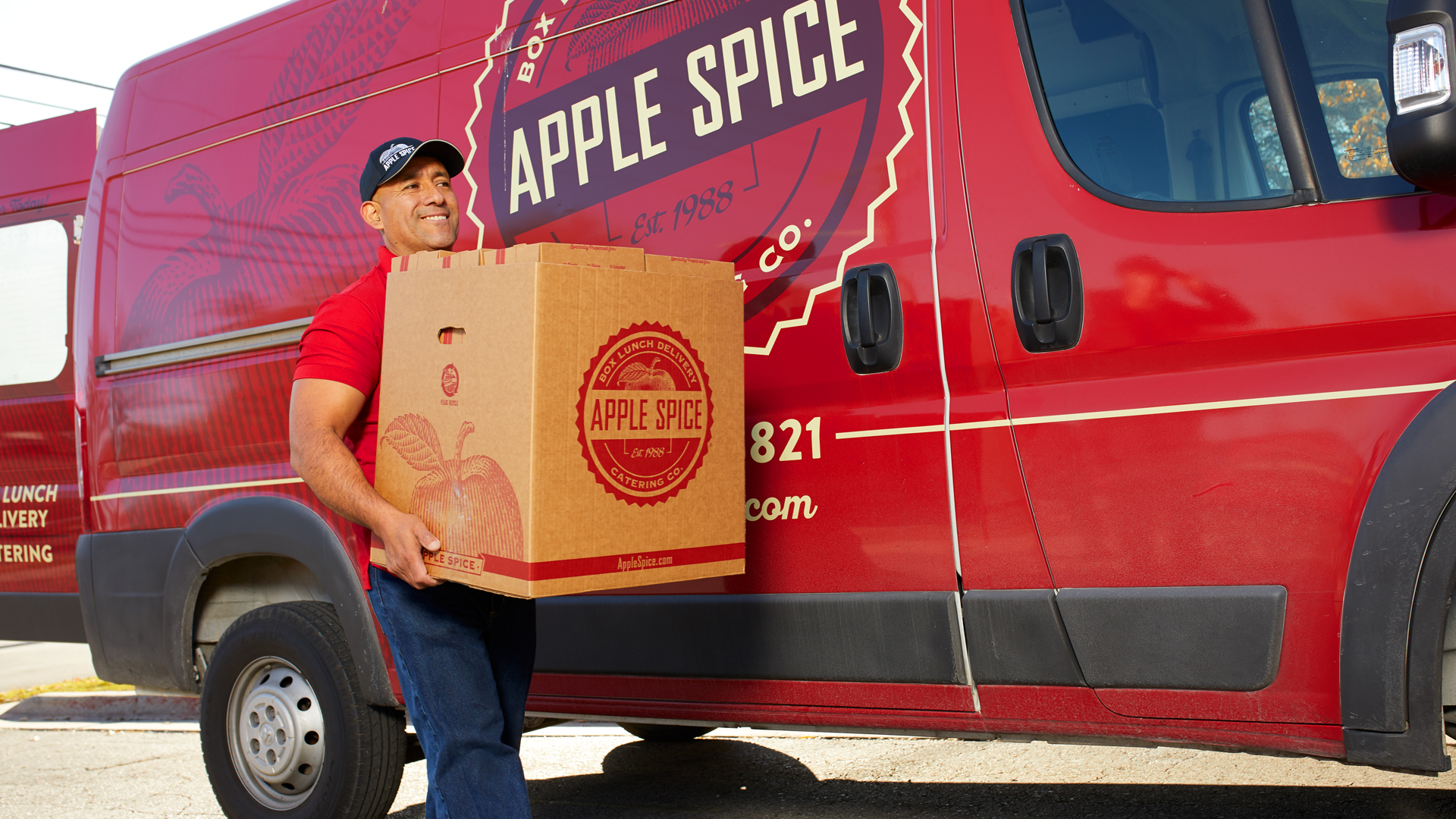 Man delivering box lunch catering in Duluth, Georgia