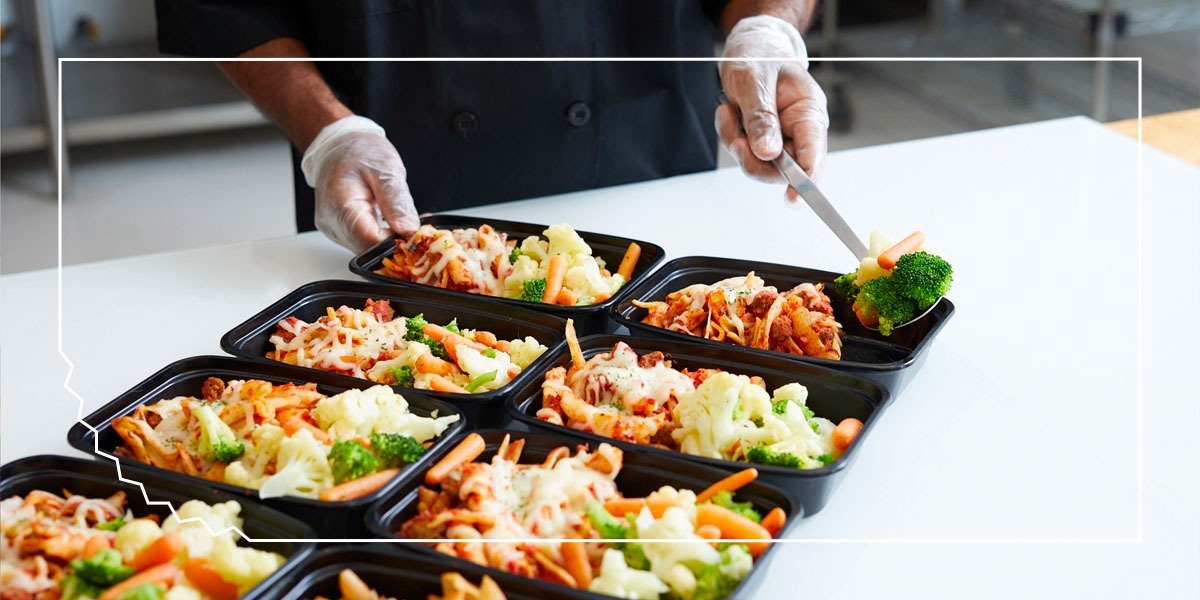 Employee preparing for catering event