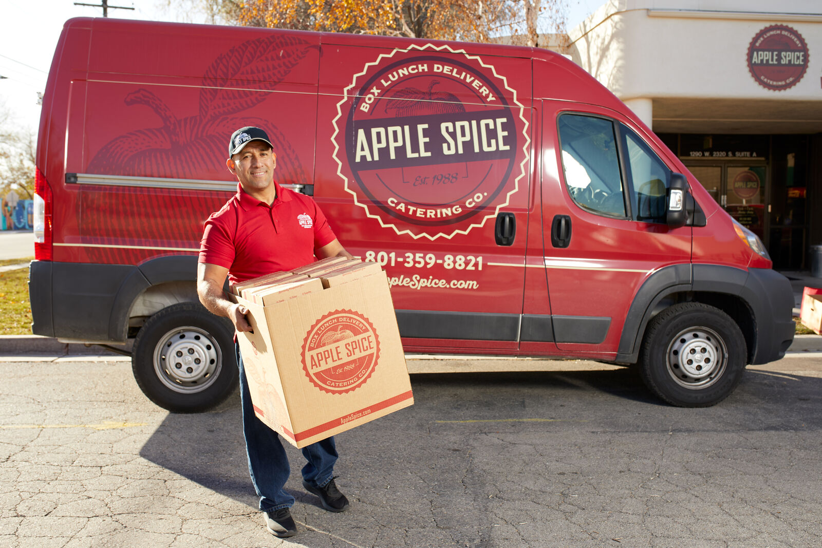 delivery man delivering box lunch catering