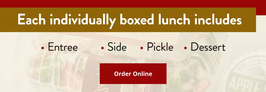 Each individually boxed lunch includes entree, side, pickle, dessert